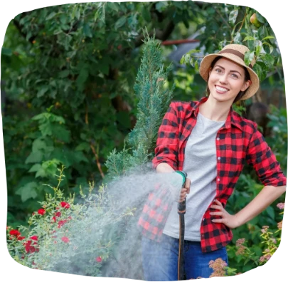 Woman watering a garden
