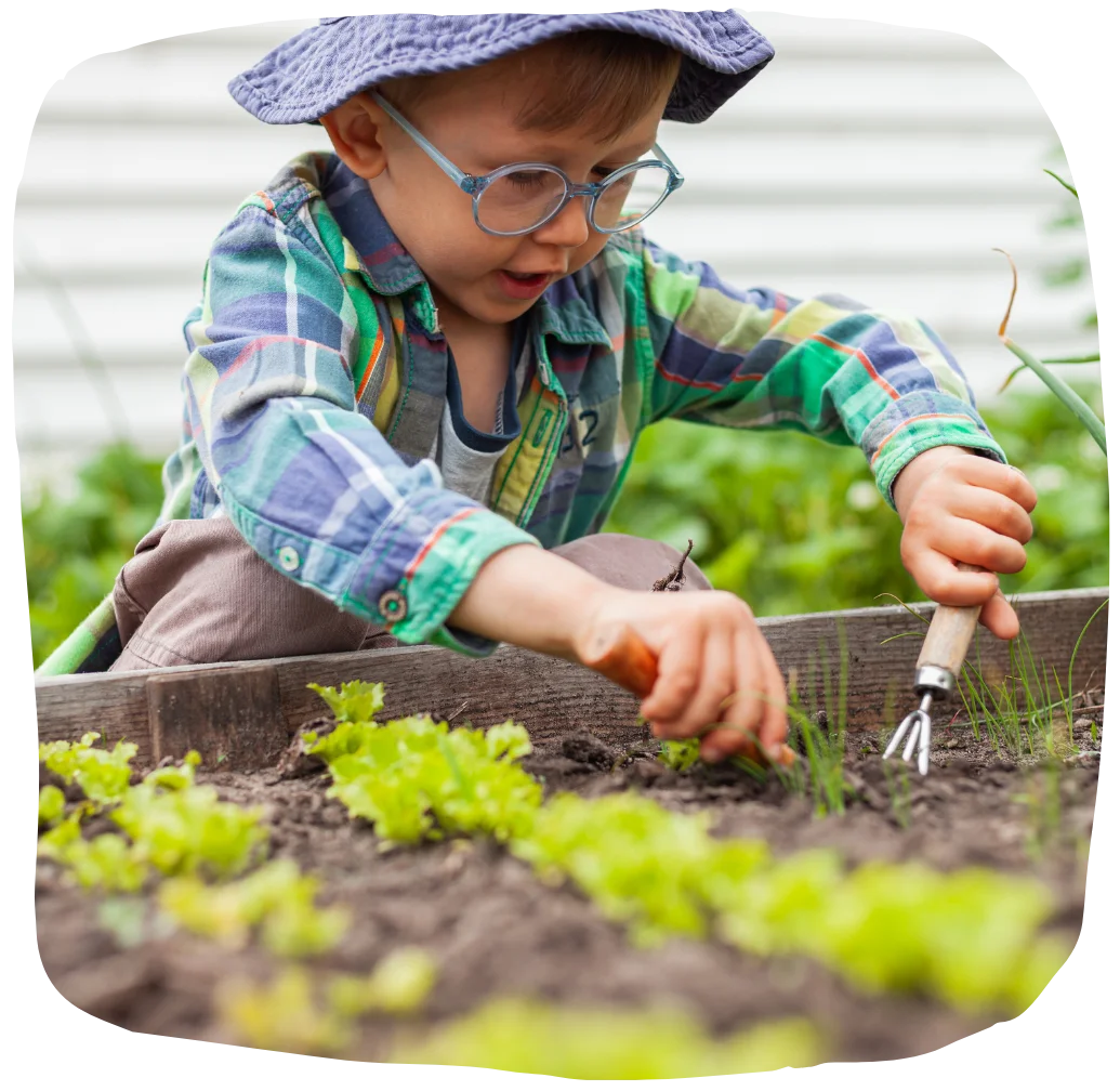 Kid Gardening Little Kid Playing in the Garden